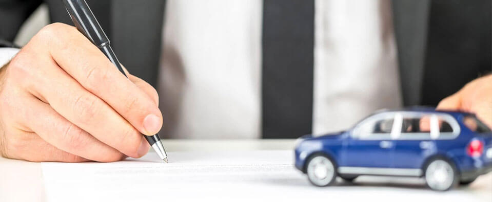 Get-Advice-For-Car-Loan-Agreement-man-Signing-on-Documents
